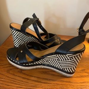 Black leather wedge sandals. Black & beige pattern heels. Size 5